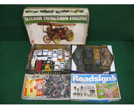 A mixed group of items to include: seven Tamiya tanks (some motorised), a partially started Bandai 1:16 scale boxed plastic k