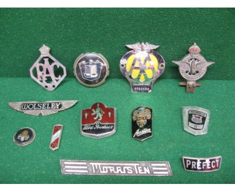 Twelve motoring and car badges to include: Austin 70, Morris 8 and 10, Wolseley, Civil Service Motoring Association etc