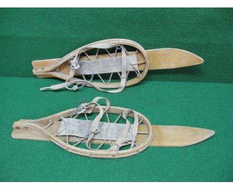 Pair of possibly WWII army snow shoes constructed from bent wood, rope and webbing - 30" long x 9" wide
