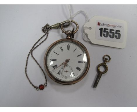 An Openface Pocketwatch, the unsigned white dial with Roman numerals and seconds subsidiary dial, within engine turned case s