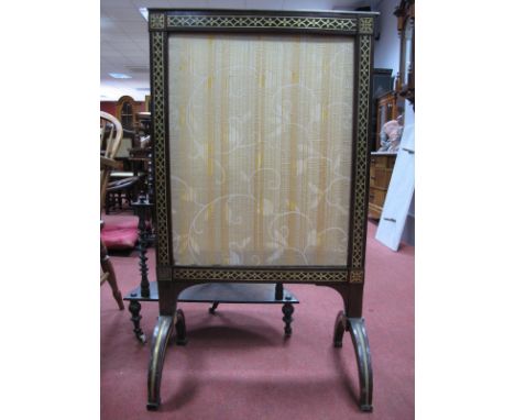 A XIX Century William IV Mahogany Brass Inlaid Fire Screen, with a silk panel, on shaped feet.