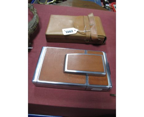 A Polaroid Alpha SX-70 Instant Folding Camera (cased).