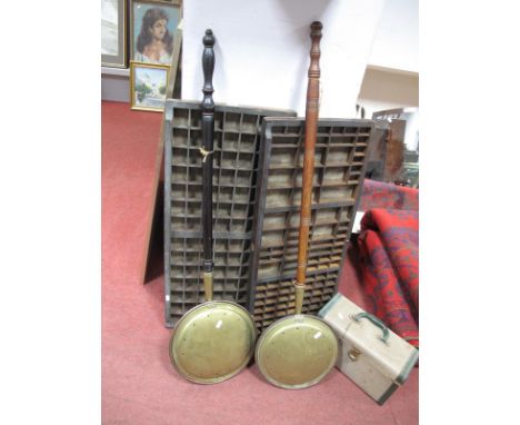 Two Vintage Printing Block Letter Racks, two brass warming pans with turned wood handles and a cased Aldislite projector. (5)
