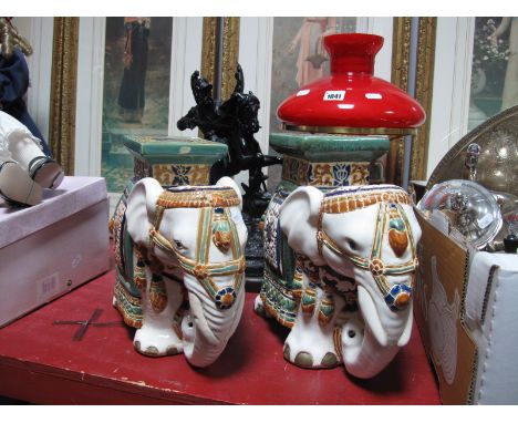 A XIX Century Spelter Figure of a Knight on Horseback, brass oil lamp and a pair of pottery elephants. (4)