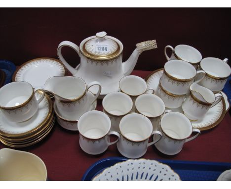 A Paragon 'Athena' Tea and Coffee Service, with tea pot, sugar an milk (approximately twenty nine pieces):- One Tray