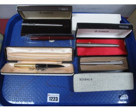A Parker Fountain Pen, with hooded nib, and inset arrow, engraved with "Richard H Abbot", in case. A Parker "17" hooded nib f