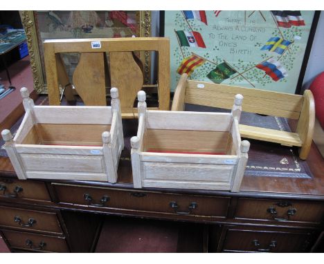 An Oak Table Top, folding magazine stand, oak extending book trough, together with a pair of limed oak planters. (4)