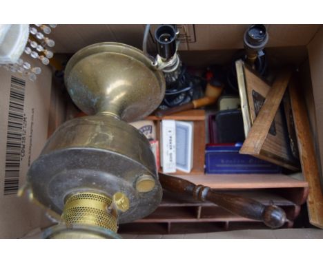 A mixed lot to include an oil lamp, miniature bed warming pan, three table lamps, letter rack, toast rack, and other items