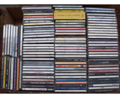 A mixed box of CDs to include music from the 1960s, 70s and 80s to include The Monkees, Elvis Presley and The Clash, approx. 