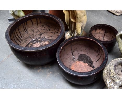 Three large glazed ceramic planters