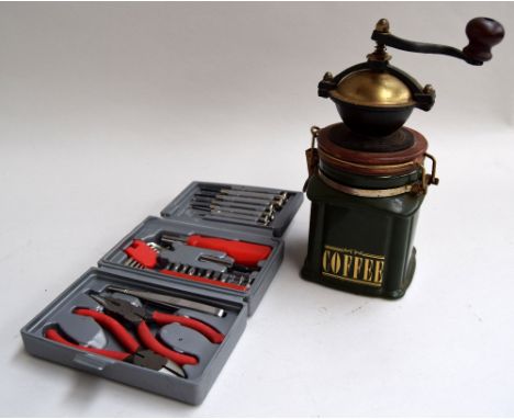 A London Pottery coffee grinder, 26cmH, and a small box of tools