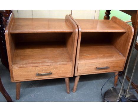 A pair of mid-century oak bedside tables, each with shelf and drawer, 59.5cmH