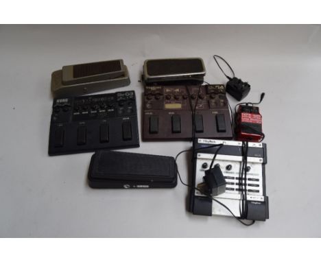 A selection of guitar pedals, including a Dunlop Cry Baby GCB-95 original wah wah pedal, Boss Loop Station, Korg G3 guitar pe