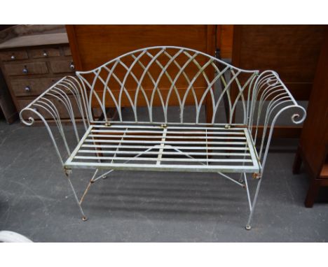 A wrought iron garden bench, 125cmL