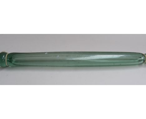 An unusually large Victorian hand-blown glass rolling pin, 58cmL