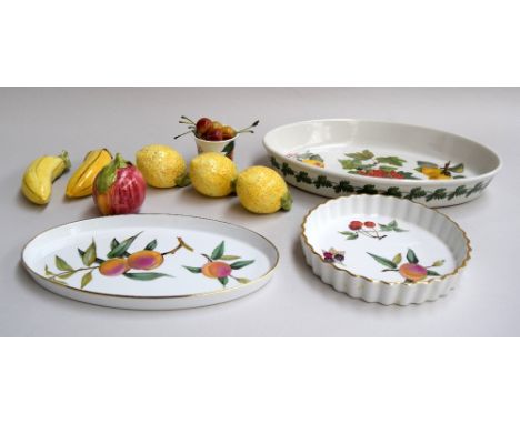 A box of ceramics including Portmeirion, Royal Worcester, and ceramic fruits
