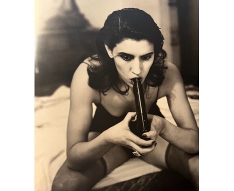 Helmut Newton (1920-2004) was a German-Australian fashion and portrait photographer known for his provocative and often contr
