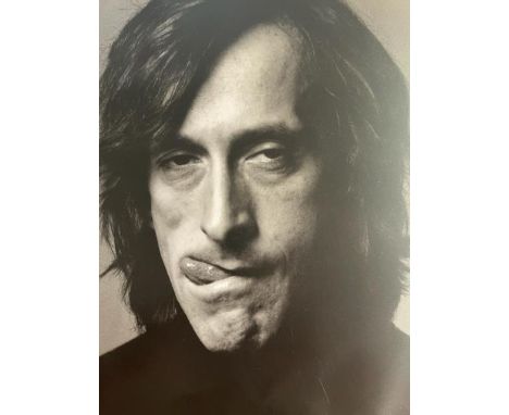 Richard Avedon (1923-2004) was an influential American fashion and portrait photographer. He was known for his distinct style