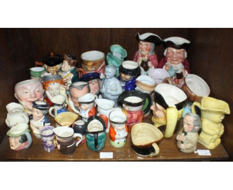 SECTION 42. A good collection of assorted ceramic character jugs including examples by Royal Doulton such as 'Queen Elizabeth