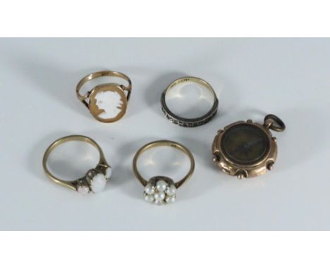 A collection of three various 9ct gold rings and one 9ct gold and silver ring, together with a 9ct gold compass fob etc. gros