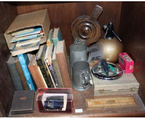 SECTION 56.  A quantity of books together with a metal soda syphon with canisters, two glass bottomed pewter tankards, cribba