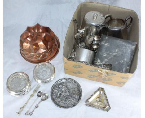 A collection of assorted silver-plated items including a three-piece tea set, assorted flatware, a set of six glass and silve