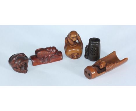Five Japanese carved boxwood netsuke comprising a bat &amp; bamboo, snake &amp; skull, monkey &amp; jar, bug &amp; bamboo and