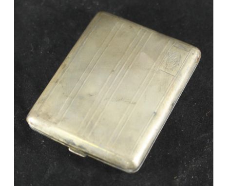 A silver cigarette case with engine turned decoration and monogram 'CS', Birmingham, 1929, maker's mark of William Neale &amp