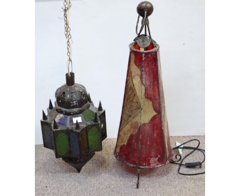 A Middle Eastern style ceiling lamp with blue, green and yellow glass panels together with a floor standing ethnic style lamp