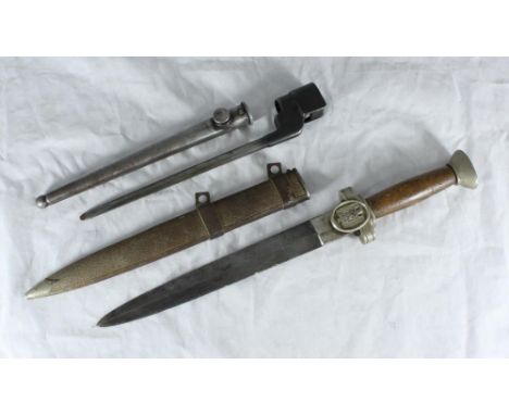 A WWII Nazi Red Cross dagger, with replacement grip and original scabbard, together with a Lee Enfield No. 4 Mk II Bayonet 