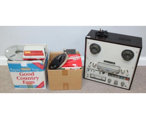 A Teac X-10 Dual Capstan Reel To Reel R2R Recorder, in stained wood effect case, together with a number of reels 