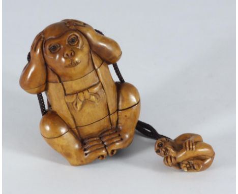 A Japanese carved boxwood Inro modelled as a monkey wearing a Jerkin, with baby monkey netsuke 
