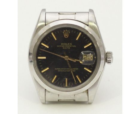 A gents stainless steel Rolex Oyster Perpetual 'Date' wristwatch ref.1500, c.1975, the black dial with gold batons denoting h