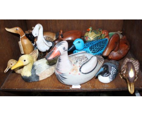 SECTIONS 34 &amp; 35.  A collection of wooden, ceramic, glass and composite ducks (on two shelves) 