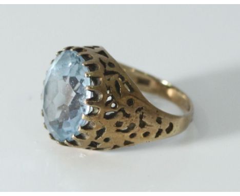 A 9ct gold ring set with a large oval cut aquamarine, gross weight approximately 8.2g 