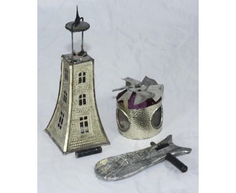 A tinplate windmill possibly German, with space for candle to make it rotate, together with an unusual tinplate rattle modell
