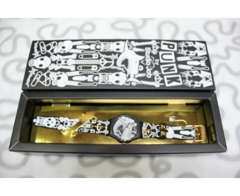 A Swatch watch 'Punk by Studio Job,' in original box with all paperwork 