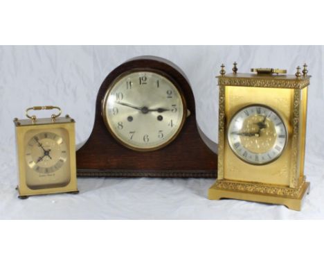 Two brass quartz carraige clocks, one by London Clock Co the other by Avia, together with a wooden mantel clock (3) 