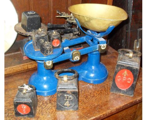 Two sets of iron kitchen scales and weights