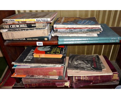 Two shelves of books relating to WW1 and WW2