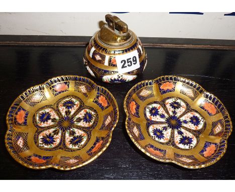 Royal Crown Derby old Imari pattern table lighter and two matching ashtrays or dishes