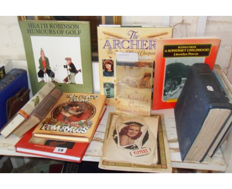 Shelf of assorted books including 1945 issue of "Victory - the weekly for India Command"