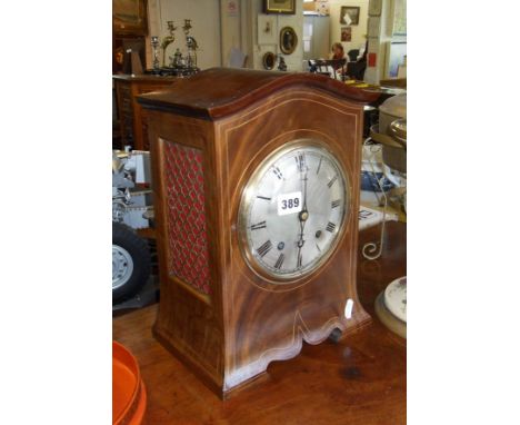 19th c. brass inlaid mahogany bracket-type mantle clock, the movement quarter striking on two gongs and having pierced brass 