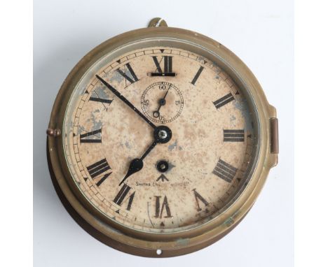 Naval Ships Brass Bulkhead Clock, with maker and arrow to dial. 