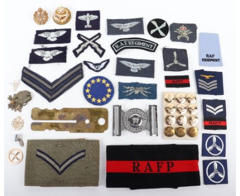 RAF Buttons and Badges: Mixed cloth and metal RAF Regiment and RAFP, arm bands, belt buckle, button stick and badges. (32 ite