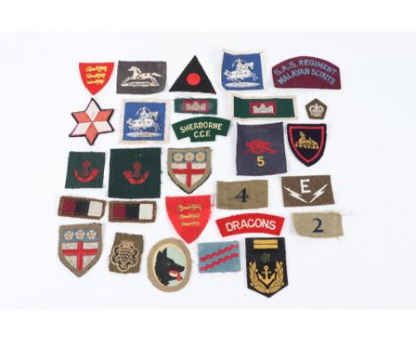 Selection of British Cloth Insignia, mostly formation signs, including Channel Islands Liberation force embroidered and print