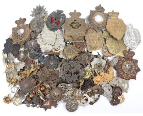 Large Quantity of British Military Helmet Plates, Shoulder Belt Plates and Headdress Badges etc, all being re-strikes and rep