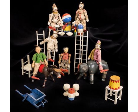 *Schoenhut (A., of Philadelphia).  A large collection of jointed wooden circus figures and animals, circa 1910,  comprising: 