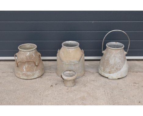 A collection of aluminium milk churns/ buckets/ pails with handles and one smaller similar item (4). Approx 54cm tall. All in