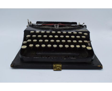 Cased Remington Portable typewriter. Sold as spares/ repairs. Untested. 